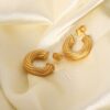 twisted cc hoop earrings – 18k gold plated